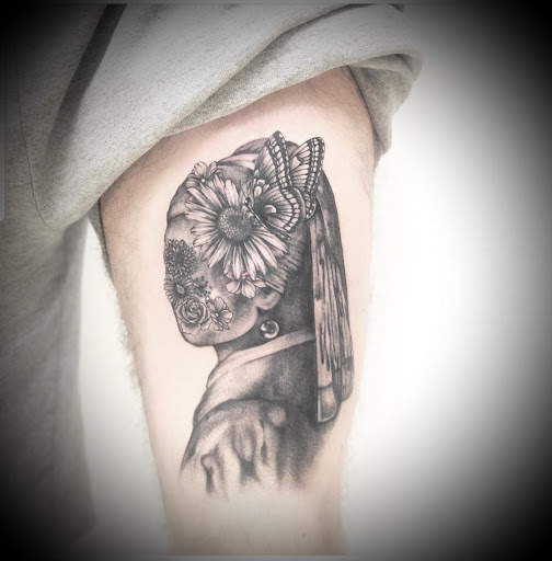 Explore ear tattoos ideas, creative tattoo ideas in Ambler, available at Tattoo GalaxyAmbler Piercing & Custom Tattoos