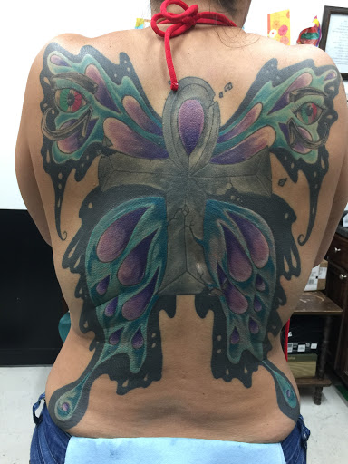 Explore blacksmith tattoo ideas, creative tattoo ideas in Lawton, available at Impact Ink Tattoo Studios