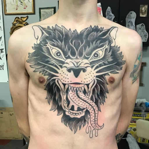 Explore banger tattoo ideas, creative tattoo ideas in Saint Paul, available at Black Coffin Tattoo