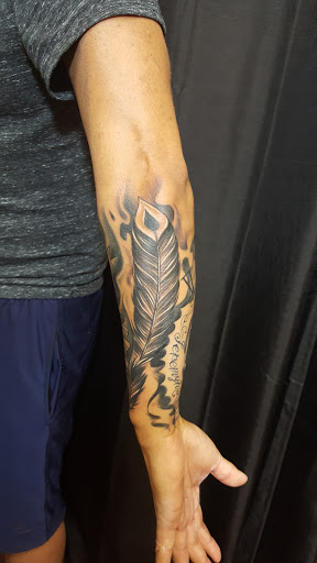 Explore grandfather tattoo ideas, creative tattoo ideas in Lancaster, available at Beautiful Sin Tattoos & Body Piercings