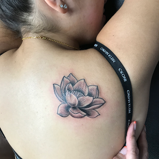 Explore small alice in wonderland tattoo ideas, creative tattoo ideas in Las Vegas, available at Las Vegas Tattoo Collective, LLC