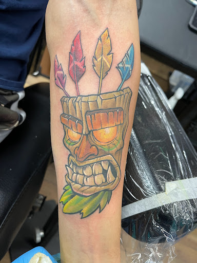 Explore spartan helmet tattoo ideas, creative tattoo ideas in Wichita, available at Addictions In Ink