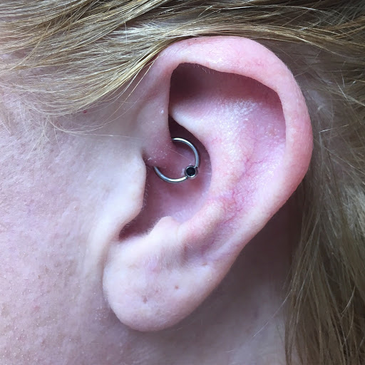 Explore tattoo ideas for women's lower back, creative tattoo ideas in Hialeah, available at The Shop Tattoo Studio