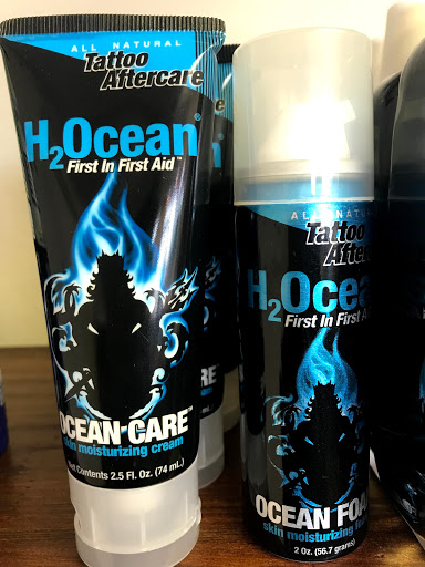 Find inbetween boob tattoo ideas for your next unique tattoo in Dallas at Fly Ink, Inc.