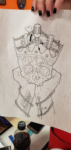 Explore tramp stamp tattoos ideas, creative tattoo ideas in Marietta, available at The Painted Sparrow Tattoo Shop And Art Gallery