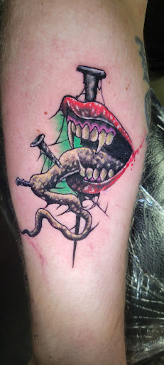 Explore tattoo body ideas, creative tattoo ideas in Angola, available at Hoodlum Ink