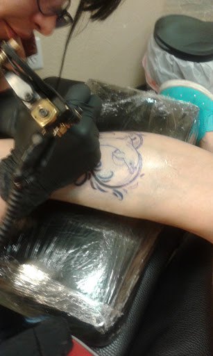 Explore bearded dragon tattoo ideas, creative tattoo ideas in Coeur D Alene, available at Jojos Tattoo & Body Piercing