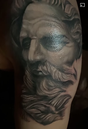 Explore flower arm sleeve tattoo ideas, creative tattoo ideas in Lemoyne, available at Ego Ink Tattoo & Body Piercing Shop