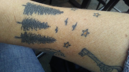 Explore tattoo ideas for men's back, creative tattoo ideas in Missoula, available at Montana Tattoo Company