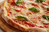 Plats et boissons du Pizzas à emporter Vincenzo Pizza à Chauray - n°1