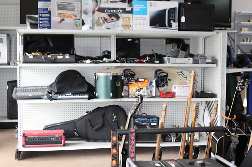 Pawn Shop «Florida Pawn & Gun», reviews and photos, 9318 E Colonial Dr, Orlando, FL 32817, USA