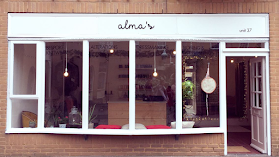 Alma's Alterations & Dressmaking