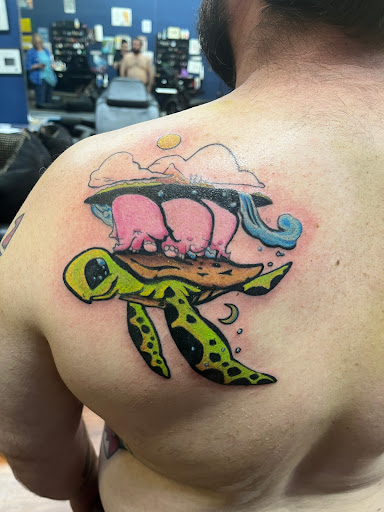 Explore small love tattoo ideas, creative tattoo ideas in Cocoa, available at Rorschach Tattoo Shop and Piercing Studio