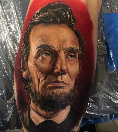Explore blessed neck tattoo ideas, creative tattoo ideas in Senoia, available at Messenger Tattoo Studio