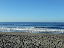 Φωτογραφία του Corinto beach με μακρά ευθεία ακτή