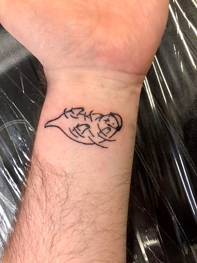 Explore isaac tattoo ideas, creative tattoo ideas in Warrensburg, available at Altered Visions Tattoo Studio