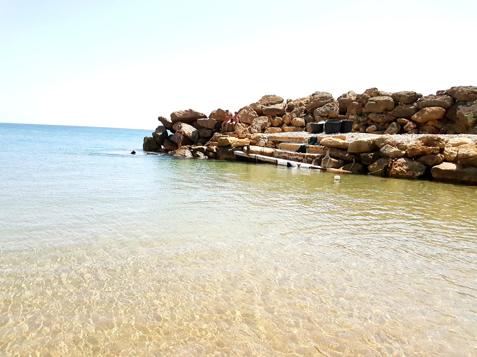 Fotografie cu Spiaggia Capo Bianco cu nivelul de curățenie înalt