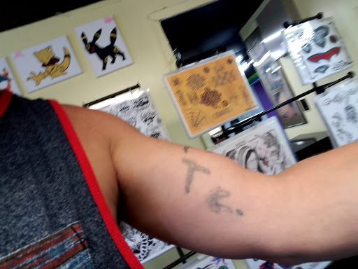 Tattoo Shop «Liquid Tattoo», reviews and photos, 16583 Old U.S. 27, Lansing, MI 48906, USA