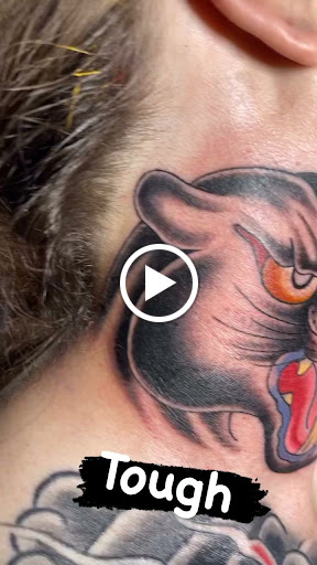 Explore dog bone tattoo ideas, creative tattoo ideas in Edgewood, available at Wild Coyote Tattoo