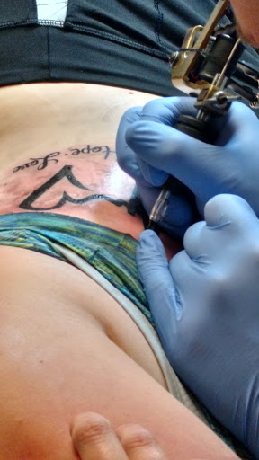 Explore cute female tattoo ideas, creative tattoo ideas in Auburn, available at Derm FX Tattoo