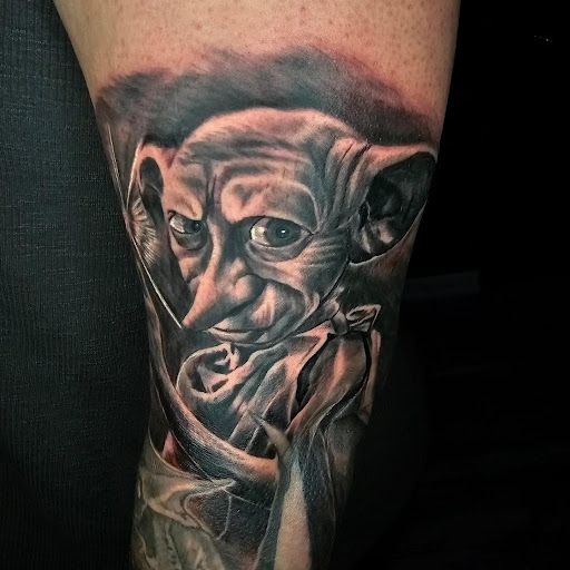 Explore dory tattoo ideas, creative tattoo ideas in Kenosha, available at Kenosha Tattoo Company