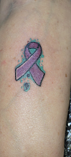 Explore bikini line tattoo ideas, creative tattoo ideas in Angola, available at Hoodlum Ink