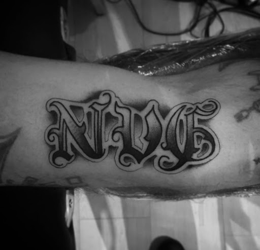 Find small mother tattoo ideas for your next unique tattoo in Lawrence at Standard Electric Tattooing
