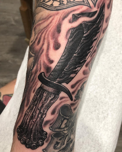 Explore son tattoo ideas, creative tattoo ideas in Tampa, available at HAWKS ELECTRIC TATTOOS