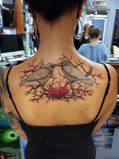 Explore cat tattoo ideas, creative tattoo ideas in Indianapolis, available at Inkfam Tattoo Gallery