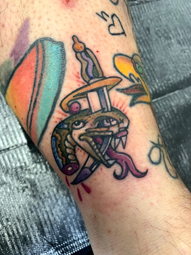 Explore tattoo ideas on back of neck, creative tattoo ideas in Augusta, available at Mr. Tattoo