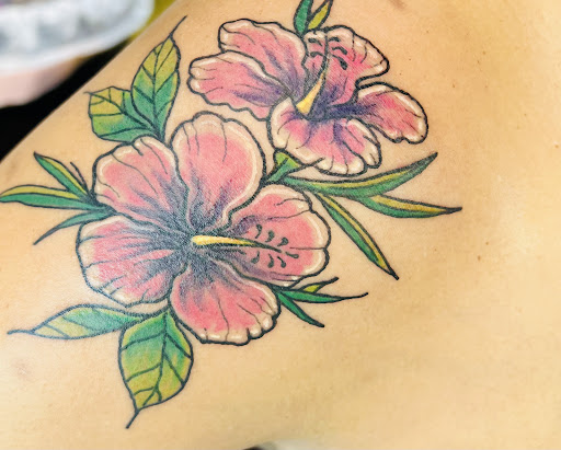Explore tattoo ideas for roses, creative tattoo ideas in Kapolei, available at Sacred Art Tattoo and Coffee Bar - Kapolei