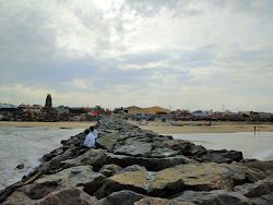 Zdjęcie Tiruvottiyur Beach i osada