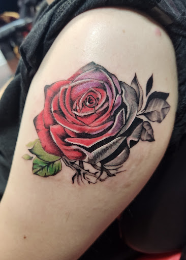 Explore breast cancer survivor tattoo ideas, creative tattoo ideas in Inverness, available at The Perfect Spot Tattoos