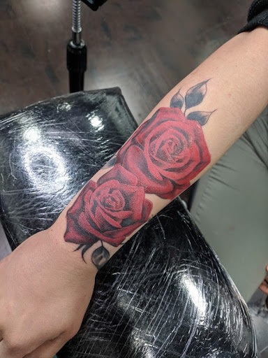 Explore thigh flower tattoo ideas, creative tattoo ideas in Fontana, available at Iconiq Tattoo Studio