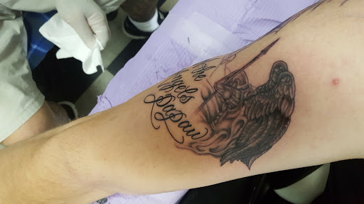 Explore palm tree tattoo ideas, creative tattoo ideas in Harriman, available at Tattoos By Bryan