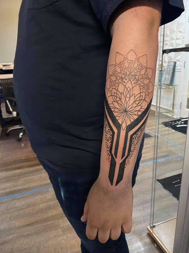 Explore the marathon continues tattoo ideas, creative tattoo ideas in Tiffin, available at Ink Element Tattoo Studio