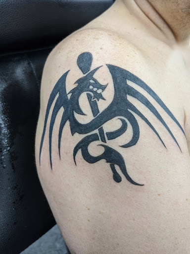 Explore family tattoo ideas for men, creative tattoo ideas in Panama City Beach, available at Revolution Tattoo & Body Piercing