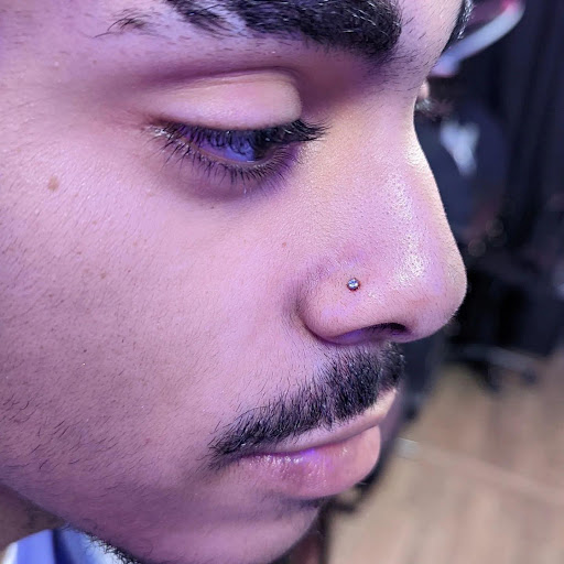 Explore side hand tattoo ideas, creative tattoo ideas in Orange Park, available at Big City Tattoo and Piercing