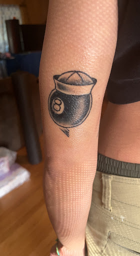 Explore charm tattoo ideas, creative tattoo ideas in San Diego, available at Sideshow Tattoo and Piercing