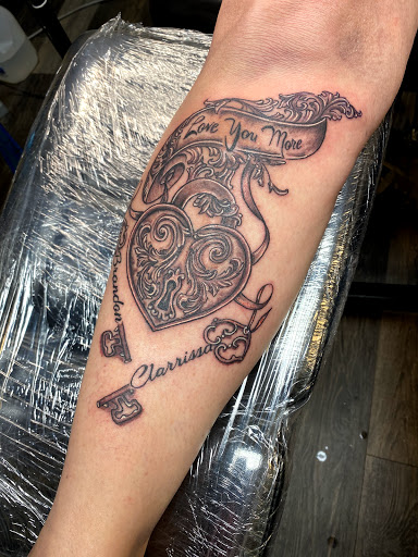 Explore snoopy and woodstock tattoo ideas, creative tattoo ideas in Warner Robins, available at Untold Pain Tattoo Studio