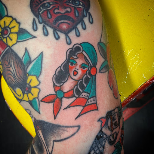 Explore back ear tattoo ideas, creative tattoo ideas in Denton, available at Black Anchor Tattoo