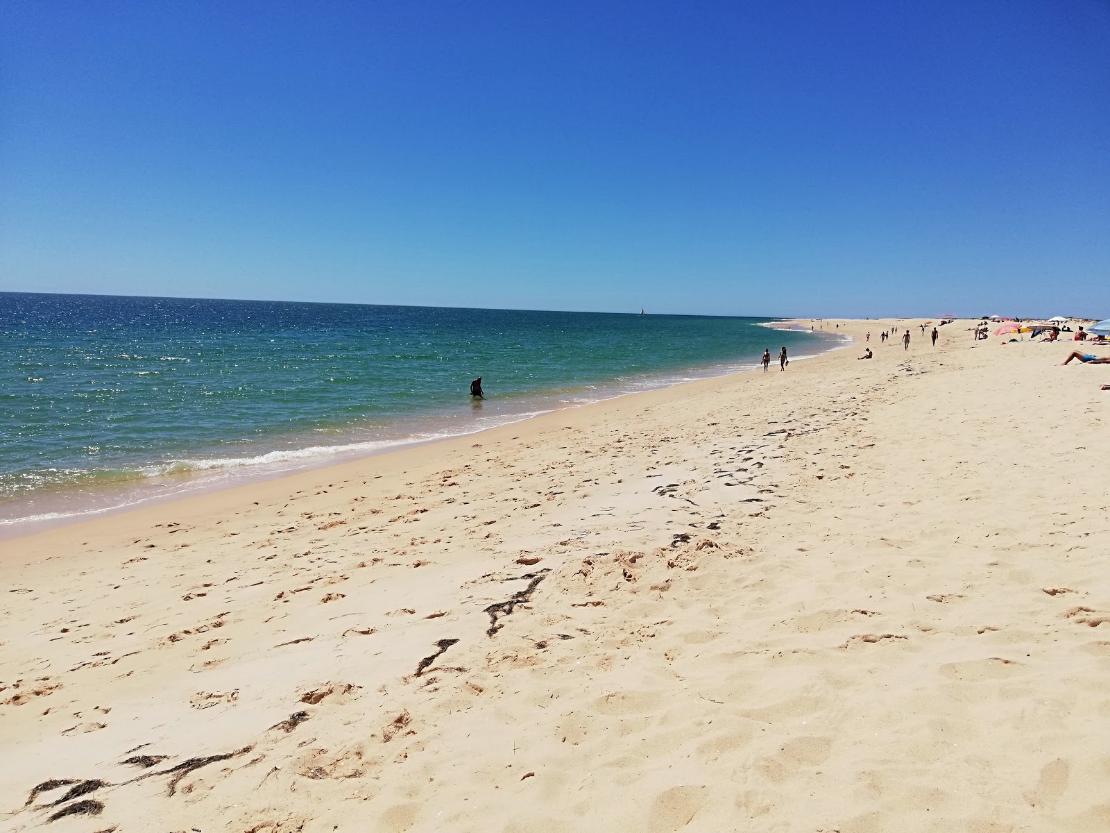 Fotografija Praia da Barreta-Mar z svetel fin pesek površino