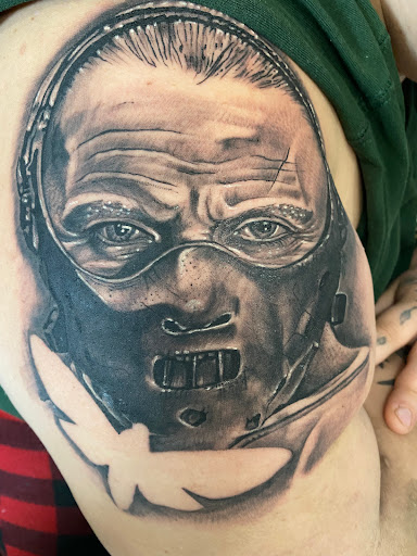 Explore charlie brown tattoo ideas, creative tattoo ideas in Lake Wales, available at Body Armor Tattoo & Piercings