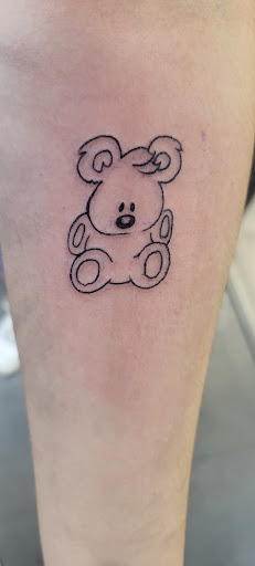 Explore tattoo ideas for book lovers, creative tattoo ideas in Las Vegas, available at Work of Art Tattoo and Piercing