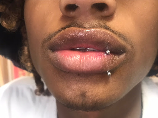 Explore bodybuilding tattoos ideas, creative tattoo ideas in Newburgh, available at Millennium Tattoo