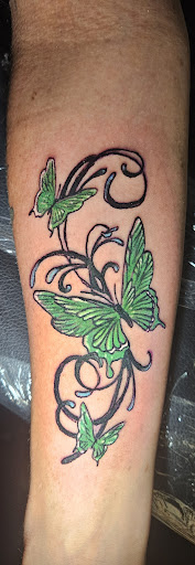 Explore awesome back tattoo ideas, creative tattoo ideas in Angola, available at Hoodlum Ink