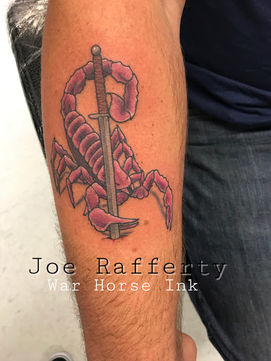 Explore couple ring tattoo ideas, creative tattoo ideas in Kent, available at War Horse Ink