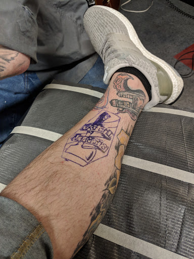 Explore mens shin tattoo ideas, creative tattoo ideas in Saint Paul, available at Black Coffin Tattoo