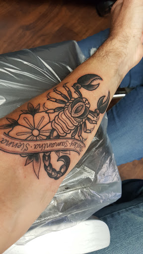 Explore soccer ball tattoo ideas, creative tattoo ideas in Ventura, available at White Lotus Body Arts Studio