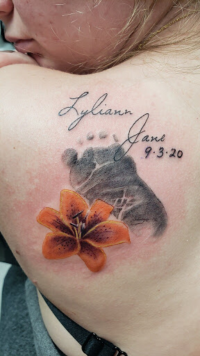 Explore march birth flower tattoo ideas, creative tattoo ideas in New Brighton, available at HereAfter Tattoo Company